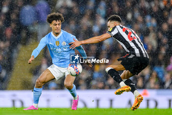 2024-03-16 - Oscar Bobb of Manchester City and Jacob Murphy of Newcastle Utd during the English FA Cup, quarter final football match between Manchester City and Newcastle United on 16 March 2024 at the Etihad Stadium in Manchester, England - FOOTBALL - ENGLISH CUP - MANCHESTER CITY V NEWCASTLE - ENGLISH LEAGUE CUP - SOCCER