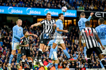 2024-03-16 - Rodri of Manchester City wins a header against Dan Burn of Newcastle Utd during the English FA Cup, quarter final football match between Manchester City and Newcastle United on 16 March 2024 at the Etihad Stadium in Manchester, England - FOOTBALL - ENGLISH CUP - MANCHESTER CITY V NEWCASTLE - ENGLISH LEAGUE CUP - SOCCER
