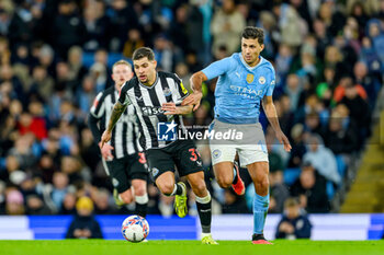 2024-03-16 - Rodri of Manchester City pulls back Bruno Guimaraes of Newcastle Utd during the English FA Cup, quarter final football match between Manchester City and Newcastle United on 16 March 2024 at the Etihad Stadium in Manchester, England - FOOTBALL - ENGLISH CUP - MANCHESTER CITY V NEWCASTLE - ENGLISH LEAGUE CUP - SOCCER