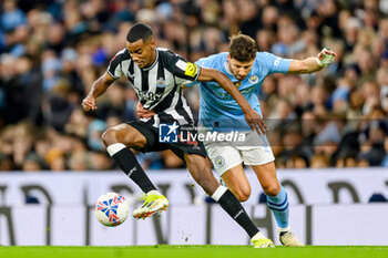 2024-03-16 - Ruben Dias of Manchester City holds back Alexander Isak of Newcastle Utd during the English FA Cup, quarter final football match between Manchester City and Newcastle United on 16 March 2024 at the Etihad Stadium in Manchester, England - FOOTBALL - ENGLISH CUP - MANCHESTER CITY V NEWCASTLE - ENGLISH LEAGUE CUP - SOCCER