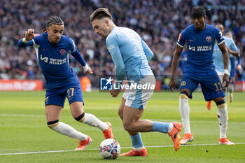 2024-04-20 - Chelsea defender Malo Gusto (27) battles with Manchester City midfielder Jack Grealish (10) during the English Cup, FA Cup, semi-final football match between Manchester City and Chelsea on 20 April 2024 at Wembley Stadium in London, England - FOOTBALL - ENGLISH CUP - MANCHESTER CITY V CHELSEA - ENGLISH LEAGUE CUP - SOCCER