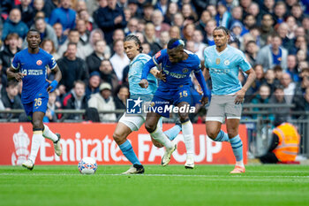 2024-04-20 - Manchester City defender Nathan Aké (6) tackles Chelsea forward Nicolas Jackson (15) during the English Cup, FA Cup, semi-final football match between Manchester City and Chelsea on 20 April 2024 at Wembley Stadium in London, England - FOOTBALL - ENGLISH CUP - MANCHESTER CITY V CHELSEA - ENGLISH LEAGUE CUP - SOCCER