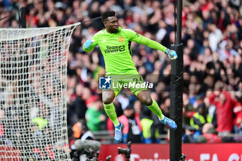 2024-04-21 - Manchester United goalkeeper Andre Onana (24) celebrates a penalty save in the shootout during the English Cup, FA Cup, semi-final football match between Coventry City and Manchester United on 21 April 2024 at Wembley Stadium in London, England - FOOTBALL - ENGLISH CUP - COVENTRY V MANCHESTER UNITED - ENGLISH LEAGUE CUP - SOCCER