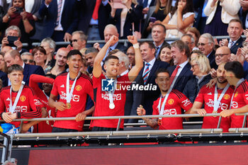 2024-05-25 - Diogo Dalot (20) of Manchester United celebrates after the 1-2 victory during the English FA Cup, Final football match between Manchester City and Manchester United on 25 May 2024 at Wembley Stadium in London, England - FOOTBALL - ENGLISH CUP - FINAL - MANCHESTER CITY V MANCHESTER UNITED - ENGLISH LEAGUE CUP - SOCCER