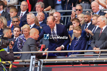 2024-05-25 - Pep Guardiola the Manchester City manager receives his medal from His Royal Highness the Prince of Wales after the English FA Cup, Final football match between Manchester City and Manchester United on 25 May 2024 at Wembley Stadium in London, England - FOOTBALL - ENGLISH CUP - FINAL - MANCHESTER CITY V MANCHESTER UNITED - ENGLISH LEAGUE CUP - SOCCER