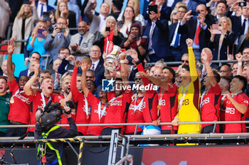 2024-05-25 - Bruno Fernandes (8) of Manchester United lifts the FA Cup after the 1-2 victory during the English FA Cup, Final football match between Manchester City and Manchester United on 25 May 2024 at Wembley Stadium in London, England - FOOTBALL - ENGLISH CUP - FINAL - MANCHESTER CITY V MANCHESTER UNITED - ENGLISH LEAGUE CUP - SOCCER