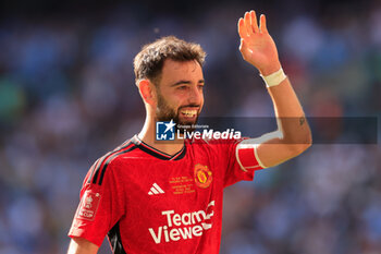 2024-05-25 - Bruno Fernandes (8) of Manchester United celebrates winning the FA Cup at the final whistle during the English FA Cup, Final football match between Manchester City and Manchester United on 25 May 2024 at Wembley Stadium in London, England - FOOTBALL - ENGLISH CUP - FINAL - MANCHESTER CITY V MANCHESTER UNITED - ENGLISH LEAGUE CUP - SOCCER