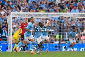 2024-05-25 - Jeremy Doku (11) of Manchester City celebrates scoring 1-2 during the English FA Cup, Final football match between Manchester City and Manchester United on 25 May 2024 at Wembley Stadium in London, England - FOOTBALL - ENGLISH CUP - FINAL - MANCHESTER CITY V MANCHESTER UNITED - ENGLISH LEAGUE CUP - SOCCER