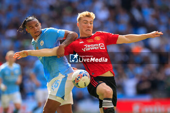 2024-05-25 - Manuel Akanji (25) of Manchester City and Rasmus Hojlund (11) of Manchester United during the English FA Cup, Final football match between Manchester City and Manchester United on 25 May 2024 at Wembley Stadium in London, England - FOOTBALL - ENGLISH CUP - FINAL - MANCHESTER CITY V MANCHESTER UNITED - ENGLISH LEAGUE CUP - SOCCER