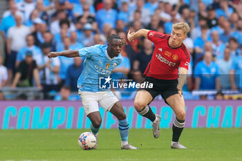 2024-05-25 - Jeremy Doku (11) of Manchester City and Rasmus Hojlund (11) of Manchester United during the English FA Cup, Final football match between Manchester City and Manchester United on 25 May 2024 at Wembley Stadium in London, England - FOOTBALL - ENGLISH CUP - FINAL - MANCHESTER CITY V MANCHESTER UNITED - ENGLISH LEAGUE CUP - SOCCER