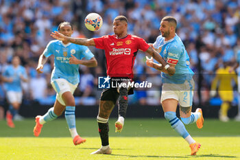 2024-05-25 - Marcus Rashford (10) of Manchester United and Kyle Walker (2) of Manchester City during the English FA Cup, Final football match between Manchester City and Manchester United on 25 May 2024 at Wembley Stadium in London, England - FOOTBALL - ENGLISH CUP - FINAL - MANCHESTER CITY V MANCHESTER UNITED - ENGLISH LEAGUE CUP - SOCCER