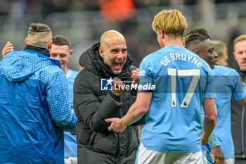 2024-01-13 - Manchester City manager Pep Guardiola celebrates with Kevin De Brunye of Manchester City at the full time during the English championship Premier League football match between Newcastle United and Manchester City on 13 January 2024 at St. James' Park in Newcastle, England - FOOTBALL - ENGLISH CHAMP - NEWCASTLE V MANCHESTER CITY - ENGLISH PREMIER LEAGUE - SOCCER