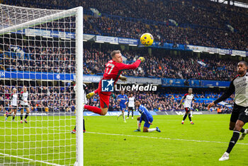 2024-01-14 - Bernd Leno (17) of Fulham dives to make a save during the English championship Premier League football match between Chelsea and Fulham on 13 January 2024 at Stamford Bridge in London, England - FOOTBALL - ENGLISH CHAMP - CHELSEA V FULHAM - ENGLISH PREMIER LEAGUE - SOCCER