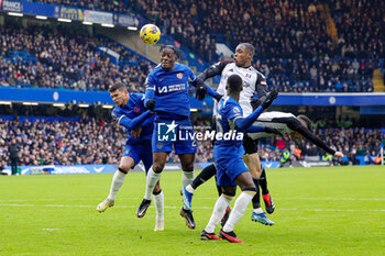 2024-01-14 - Axel Disasi (2) of Chelsea heads the ball during the English championship Premier League football match between Chelsea and Fulham on 13 January 2024 at Stamford Bridge in London, England - FOOTBALL - ENGLISH CHAMP - CHELSEA V FULHAM - ENGLISH PREMIER LEAGUE - SOCCER