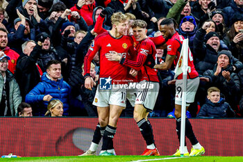 2024-01-15 - Rasmus Hojlund (11) of Manchester United scores a goal and celebrates 1-0 during the English championship Premier League football match between Manchester United and Tottenham Hotspur on 14 January 2024 at Old Trafford in Manchester, England - FOOTBALL - ENGLISH CHAMP - MANCHESTER UNITED V TOTTENHAM - ENGLISH PREMIER LEAGUE - SOCCER