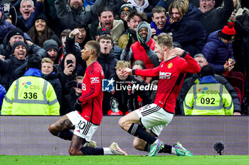 2024-01-15 - Marcus Rashford (10) of Manchester United scores a goal and celebrates 2-1 during the English championship Premier League football match between Manchester United and Tottenham Hotspur on 14 January 2024 at Old Trafford in Manchester, England - FOOTBALL - ENGLISH CHAMP - MANCHESTER UNITED V TOTTENHAM - ENGLISH PREMIER LEAGUE - SOCCER