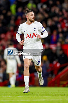 2024-01-15 - Radu Dragușin (6) of Tottenham Hotspur during the English championship Premier League football match between Manchester United and Tottenham Hotspur on 14 January 2024 at Old Trafford in Manchester, England - FOOTBALL - ENGLISH CHAMP - MANCHESTER UNITED V TOTTENHAM - ENGLISH PREMIER LEAGUE - SOCCER
