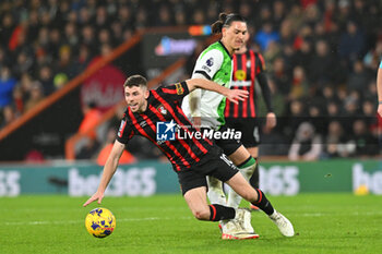 2024-01-21 - Ryan Christie (10) of AFC Bournemouth battles for possession with Darwin Nunez (9) of Liverpool during the English championship Premier League football match between Bournemouth and Liverpool on 21 January 2024 at the Vitality Stadium in Bournemouth, England - FOOTBALL - ENGLISH CHAMP - BOURNEMOUTH V LIVERPOOL - ENGLISH PREMIER LEAGUE - SOCCER
