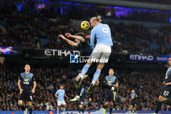 2024-01-31 - Manchester City forward Erling Haaland and Dara O'Shea of Burnley during the English championship Premier League football match between Manchester City and Burnley on 31 January 2024 at the Etihad Stadium in Manchester, England - FOOTBALL - ENGLISH CHAMP - MANCHESTER CITY V BURNLEY - ENGLISH PREMIER LEAGUE - SOCCER