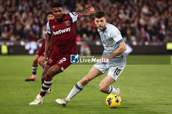 2024-02-01 - Ryan Christie of Bournemouth and Ben Johnson of West Ham during the English championship Premier League football match between West Ham United and Bournemouth on 1 February 2024 at the London Stadium in London, England - FOOTBALL - ENGLISH CHAMP - WEST HAM V BOURNEMOUTH - ENGLISH PREMIER LEAGUE - SOCCER
