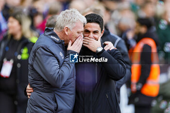 2024-02-12 - David Moyes Manager of West Ham United greets Mikel Arteta Manager of Arsenal during the English championship Premier League football match between West Ham United and Arsenal on 11 February 2024 at the London Stadium in London, England - FOOTBALL - ENGLISH CHAMP - WEST HAM V ARSENAL - ENGLISH PREMIER LEAGUE - SOCCER