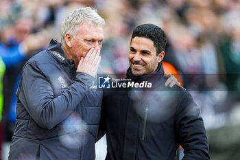 2024-02-12 - David Moyes Manager of West Ham United greets Mikel Arteta Manager of Arsenal during the English championship Premier League football match between West Ham United and Arsenal on 11 February 2024 at the London Stadium in London, England - FOOTBALL - ENGLISH CHAMP - WEST HAM V ARSENAL - ENGLISH PREMIER LEAGUE - SOCCER