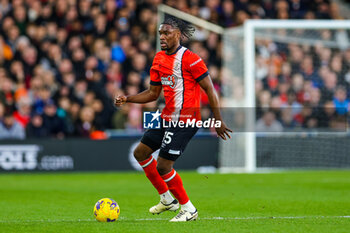 2024-02-18 - Teden Mengi (15) of Luton Town during the English championship Premier League football match between Luton Town and Manchester United on 18 February 2024 at Kenilworth Road in Luton, England - FOOTBALL - ENGLISH CHAMP - LUTON TOWN V MANCHESTER UNITED - ENGLISH PREMIER LEAGUE - SOCCER