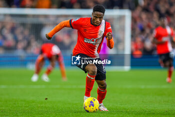 2024-02-18 - Chiedozie Ogbene (7) of Luton Town during the English championship Premier League football match between Luton Town and Manchester United on 18 February 2024 at Kenilworth Road in Luton, England - FOOTBALL - ENGLISH CHAMP - LUTON TOWN V MANCHESTER UNITED - ENGLISH PREMIER LEAGUE - SOCCER