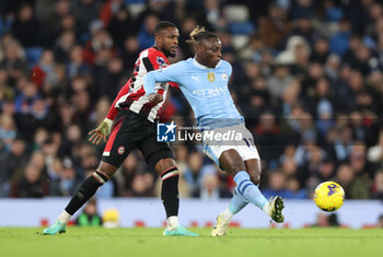 2024-02-20 - Jeremy Doku of Manchester City, Frank Onyeka of Brentford during the English championship Premier League football match between Manchester City and Brentford on 20 February 2024 at the Etihad Stadium in Manchester, England - FOOTBALL - ENGLISH CHAMP - MANCHESTER CITY V BRENTFORD - ENGLISH PREMIER LEAGUE - SOCCER