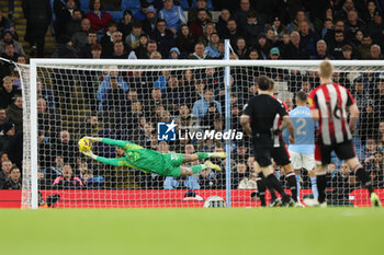2024-02-20 - Goalkeeper Ederson of Manchester City makes a save during the English championship Premier League football match between Manchester City and Brentford on 20 February 2024 at the Etihad Stadium in Manchester, England - FOOTBALL - ENGLISH CHAMP - MANCHESTER CITY V BRENTFORD - ENGLISH PREMIER LEAGUE - SOCCER