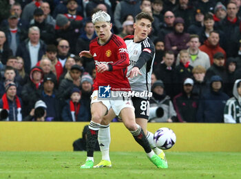 2024-02-24 - Manchester United forward Alajandro Garnacho (17) and Fulham midfielder Harry Wilson (8) during the English championship Premier League football match between Manchester United and Fulham on 24 February 2024 at Old Trafford in Manchester, England - FOOTBALL - ENGLISH CHAMP - MANCHESTER UNITED V FULHAM - ENGLISH PREMIER LEAGUE - SOCCER