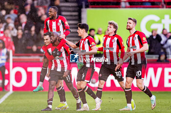 2024-03-03 - Yoane Wissa (11) of Brentford scores a goal and celebrates 2-1 during the English championship Premier League football match between Brentford and Chelsea on 2 March 2024 at Gtech Community Stadium in Brentford, England - FOOTBALL - ENGLISH CHAMP - BRENTFORD V CHELSEA - ENGLISH PREMIER LEAGUE - SOCCER