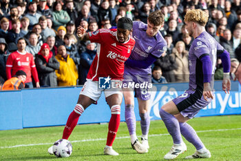 2024-03-02 - Nottingham Forest forward Divock Origi (27) and Conor Bradley of Liverpool during the English championship Premier League football match between Nottingham Forest and Liverpool on 2 March 2024 at the City Ground in Nottingham, England - FOOTBALL - ENGLISH CHAMP - NOTTINGHAM FOREST V LIVERPOOL - ENGLISH PREMIER LEAGUE - SOCCER