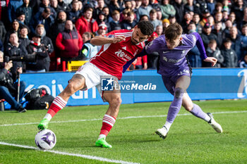2024-03-02 - Nottingham Forest midfielder Morgan Gibbs-White (10) and Conor Bradley of Liverpool during the English championship Premier League football match between Nottingham Forest and Liverpool on 2 March 2024 at the City Ground in Nottingham, England - FOOTBALL - ENGLISH CHAMP - NOTTINGHAM FOREST V LIVERPOOL - ENGLISH PREMIER LEAGUE - SOCCER