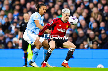 2024-03-04 - Alejandro Garnacho (17) of Manchester United and Nathan Aké of Manchester City during the English championship Premier League football match between Manchester City and Manchester United on 3 March 2024 at the Etihad Stadium in Manchester, England - FOOTBALL - ENGLISH CHAMP - MANCHESTER CITY V MANCHESTER UNITED - ENGLISH PREMIER LEAGUE - SOCCER