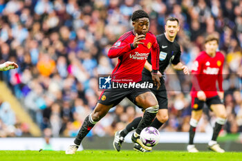 2024-03-04 - Kobbie Mainoo (37) of Manchester United during the English championship Premier League football match between Manchester City and Manchester United on 3 March 2024 at the Etihad Stadium in Manchester, England - FOOTBALL - ENGLISH CHAMP - MANCHESTER CITY V MANCHESTER UNITED - ENGLISH PREMIER LEAGUE - SOCCER