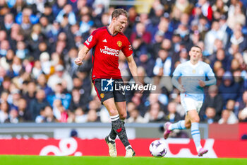 2024-03-04 - Jonny Evans (35) of Manchester United during the English championship Premier League football match between Manchester City and Manchester United on 3 March 2024 at the Etihad Stadium in Manchester, England - FOOTBALL - ENGLISH CHAMP - MANCHESTER CITY V MANCHESTER UNITED - ENGLISH PREMIER LEAGUE - SOCCER