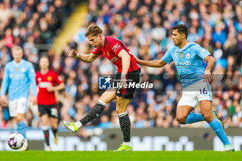 2024-03-04 - Scott McTominay (39) of Manchester United and Rodri of Manchester City during the English championship Premier League football match between Manchester City and Manchester United on 3 March 2024 at the Etihad Stadium in Manchester, England - FOOTBALL - ENGLISH CHAMP - MANCHESTER CITY V MANCHESTER UNITED - ENGLISH PREMIER LEAGUE - SOCCER