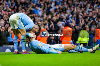 2024-03-04 - Erling Haaland (9) of Manchester City scores a goal and celebrates 3-1 with Phil Foden during the English championship Premier League football match between Manchester City and Manchester United on 3 March 2024 at the Etihad Stadium in Manchester, England - FOOTBALL - ENGLISH CHAMP - MANCHESTER CITY V MANCHESTER UNITED - ENGLISH PREMIER LEAGUE - SOCCER