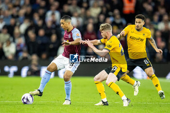 2024-03-30 - Aston Villa midfielder Youri Tielemans (8) and Tommy Doyle of Wolverhampton during the English championship Premier League football match between Aston Villa and Wolverhampton Wanderers on 30 March 2024 at Villa Park in Birmingham, England - FOOTBALL - ENGLISH CHAMP - ASTON VILLA V WOLVERHAMPTON - ENGLISH PREMIER LEAGUE - SOCCER