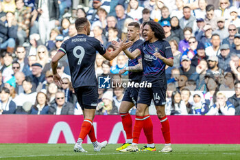 2024-03-30 - Luton Town forward Tahith Chong (14) scores and celebrates 0-1 during the English championship Premier League football match between Tottenham Hotspur and Luton Town on 30 March 2024 at Tottenham Hotspur Stadium in London, England - FOOTBALL - ENGLISH CHAMP - TOTTENHAM V LUTON TOWN - ENGLISH PREMIER LEAGUE - SOCCER