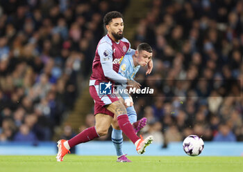 2024-04-03 - Douglas Luiz of Aston Villa and Phil Foden of Manchester City during the English championship Premier League football match between Manchester City and Aston Villa on 3 April 2024 at the Etihad Stadium in Manchester, England - FOOTBALL - ENGLISH CHAMP - MANCHESTER CITY V ASTON VILLA - ENGLISH PREMIER LEAGUE - SOCCER
