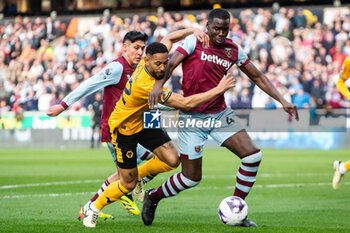 06/04/2024 - Wolverhampton Wanderers forward Matheus Cunha (12) battles for possession with West Ham Utd defender Kurt Zouma (4) during the English championship Premier League football match between Wolverhampton Wanderers and West Ham United on 6 April 2024 at Molineux in Wolverhampton, England - FOOTBALL - ENGLISH CHAMP - WOLVERHAMPTON V WEST HAM - ENGLISH PREMIER LEAGUE - CALCIO
