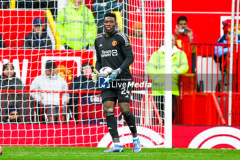 2024-04-08 - André Onana (24) of Manchester United during the English championship Premier League football match between Manchester United and Liverpool on 7 April 2024 at Old Trafford in Manchester, England - FOOTBALL - ENGLISH CHAMP - MANCHESTER UNITED V LIVERPOOL - ENGLISH PREMIER LEAGUE - SOCCER