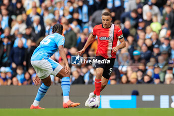 2024-04-13 - Carlton Morris (9) of Luton Town during the English championship Premier League football match between Manchester City and Luton Town on 13 April 2024 at the Etihad Stadium in Manchester, England - FOOTBALL - ENGLISH CHAMP - MANCHESTER CITY V LUTON TOWN - ENGLISH PREMIER LEAGUE - SOCCER