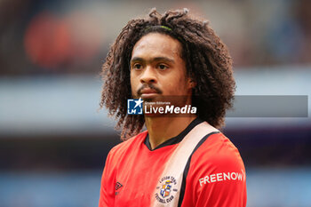 2024-04-13 - Tahith Chong (14) of Luton Town during the English championship Premier League football match between Manchester City and Luton Town on 13 April 2024 at the Etihad Stadium in Manchester, England - FOOTBALL - ENGLISH CHAMP - MANCHESTER CITY V LUTON TOWN - ENGLISH PREMIER LEAGUE - SOCCER