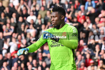 2024-04-13 - Andre Onana (24) of Manchester United during the English championship Premier League football match between Bournemouth and Manchester United on 13 April 2024 at the Vitality Stadium in Bournemouth, England - FOOTBALL - ENGLISH CHAMP - BOURNEMOUTH V MANCHESTER UNITED - ENGLISH PREMIER LEAGUE - SOCCER