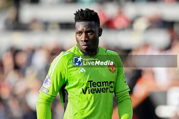 2024-04-13 - Andre Onana (24) of Manchester United during the English championship Premier League football match between Bournemouth and Manchester United on 13 April 2024 at the Vitality Stadium in Bournemouth, England - FOOTBALL - ENGLISH CHAMP - BOURNEMOUTH V MANCHESTER UNITED - ENGLISH PREMIER LEAGUE - SOCCER