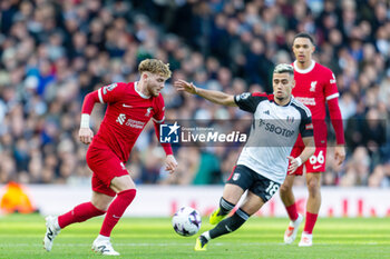 2024-04-21 - Liverpool midfielder Harvey Elliott (19) and Fulham midfielder Andreas Pereira (18) during the English championship Premier League football match between Fulham and Liverpool on 21 April 2024 at Craven Cottage in London, England - FOOTBALL - ENGLISH CHAMP - FULHAM V LIVERPOOL - ENGLISH PREMIER LEAGUE - SOCCER