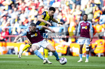 2024-04-21 - Aston Villa midfielder John McGinn (7) battles for possession with Bournemouth forward Dominic Solanke (9) during the English championship Premier League football match between Aston Villa and Bournemouth on 21 April 2024 at Villa Park in Birmingham, England - FOOTBALL - ENGLISH CHAMP - ASTON VILLA V BOURNEMOUTH - ENGLISH PREMIER LEAGUE - SOCCER